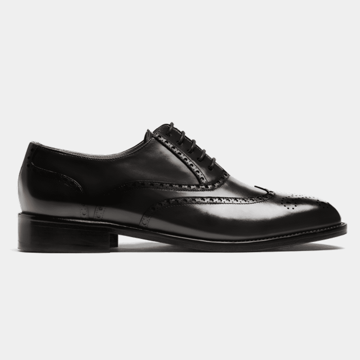 mottle leather flat brogues in black