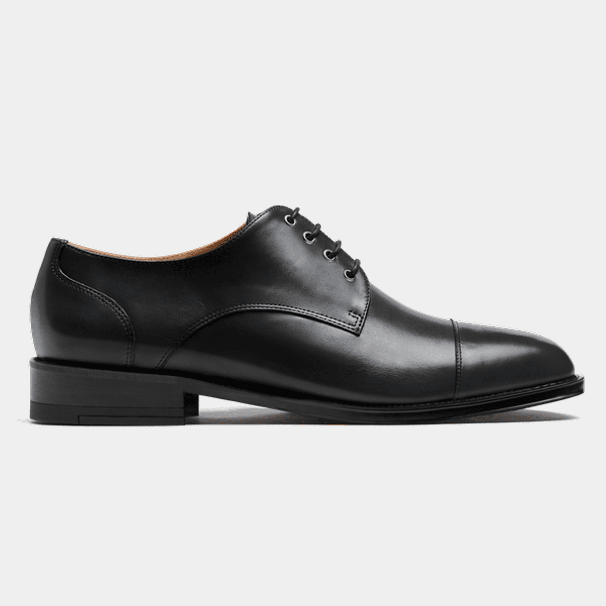 Cap toe Derby dress shoes in black leather