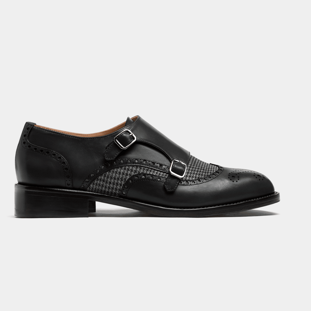 mottle leather flat brogues in black