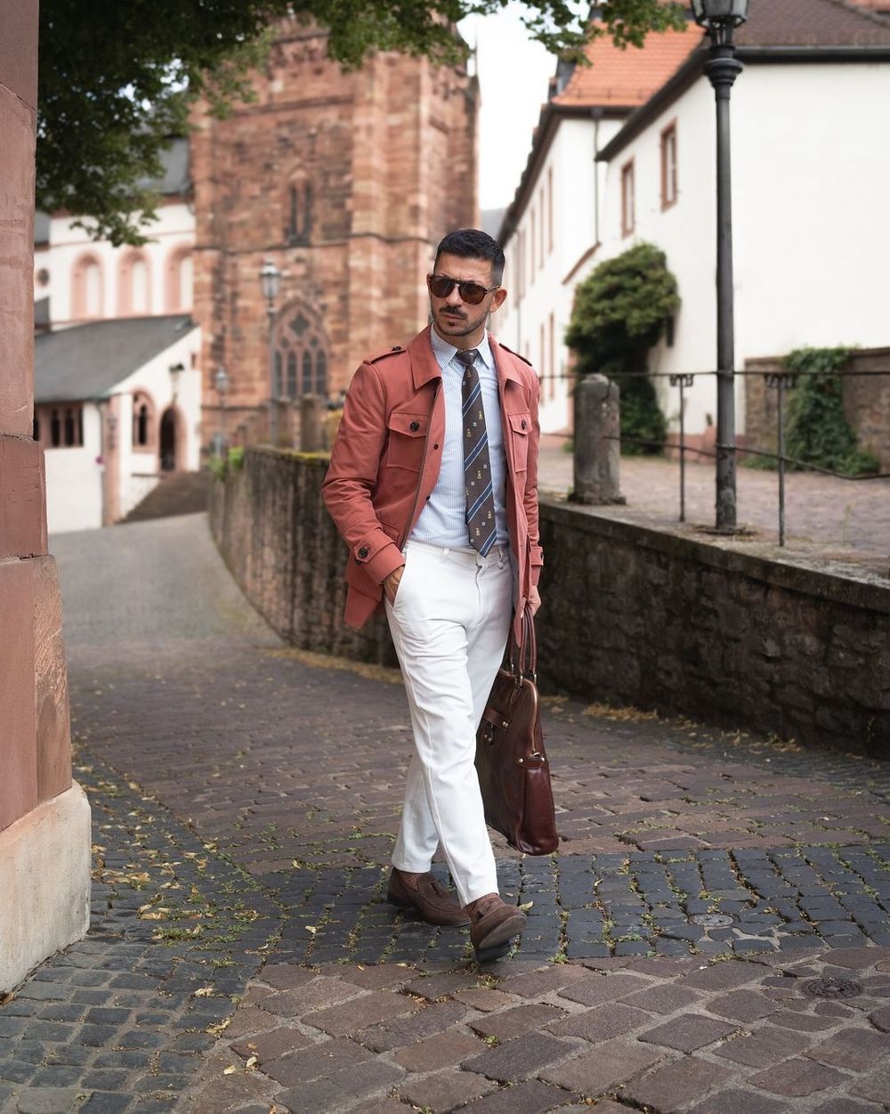 Rust Jacket with White Trousers and Blue Striped Shirt