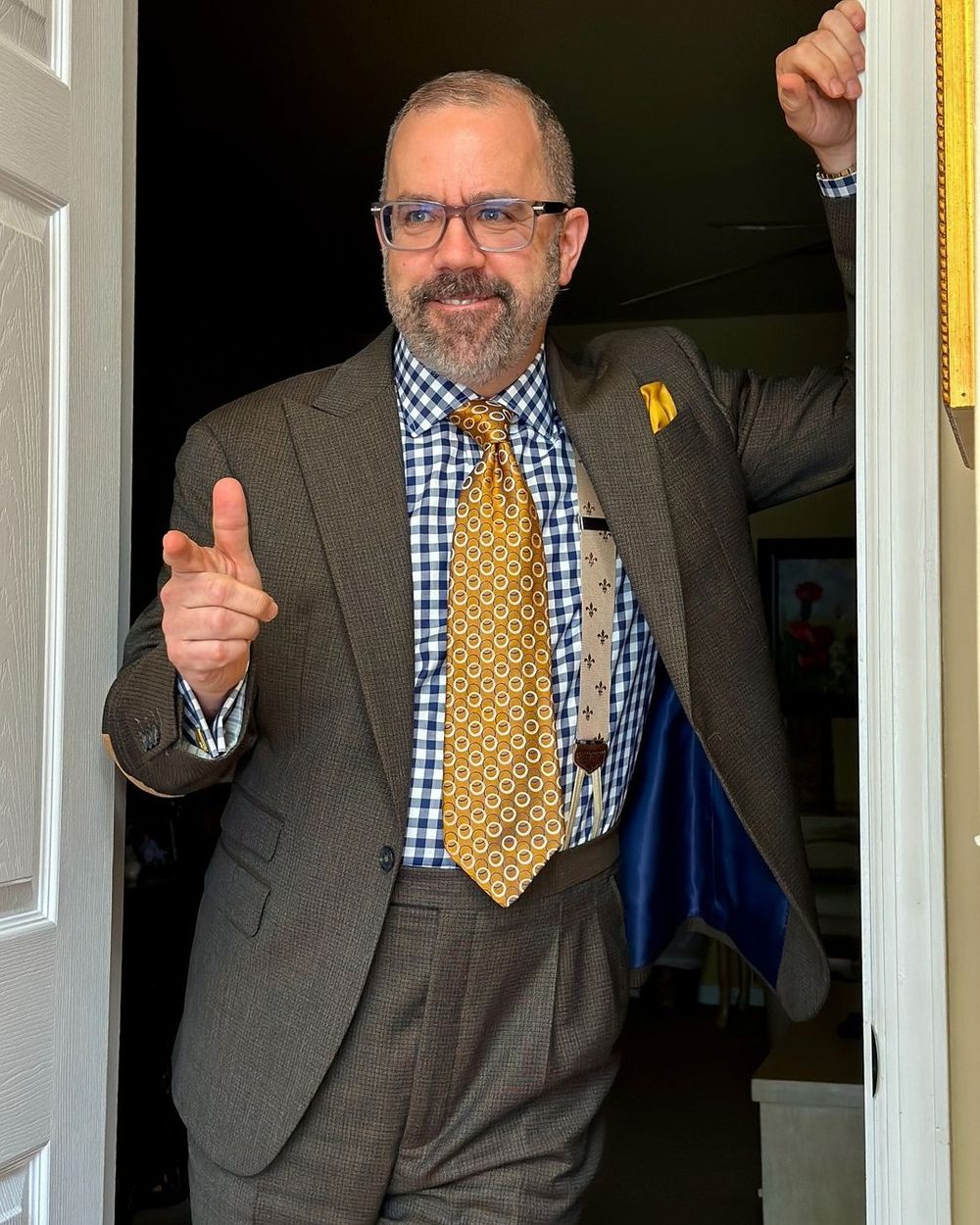 Brown Suit with Patterned Shirt and Yellow Tie