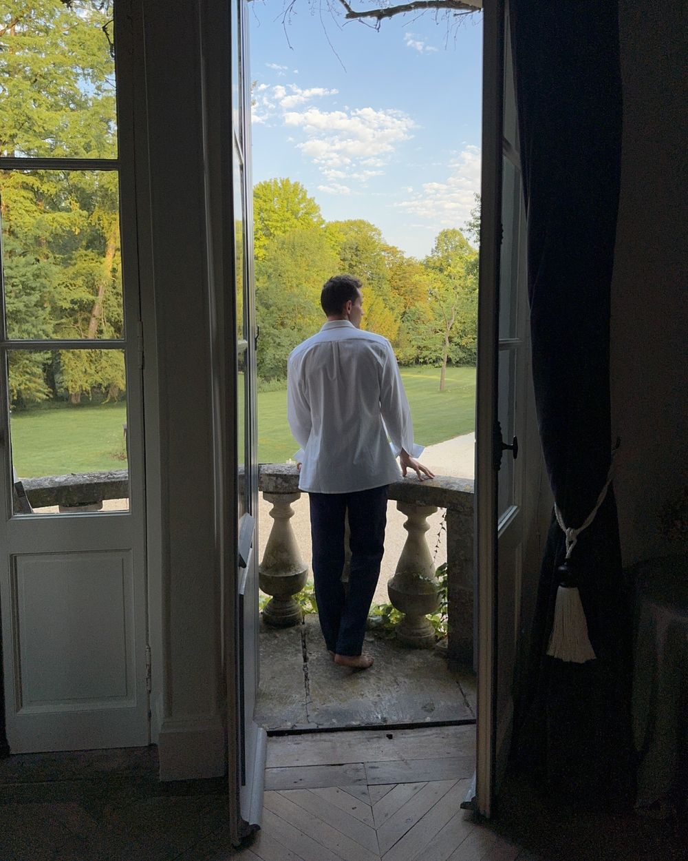 White Linen Shirt with Navy Trousers