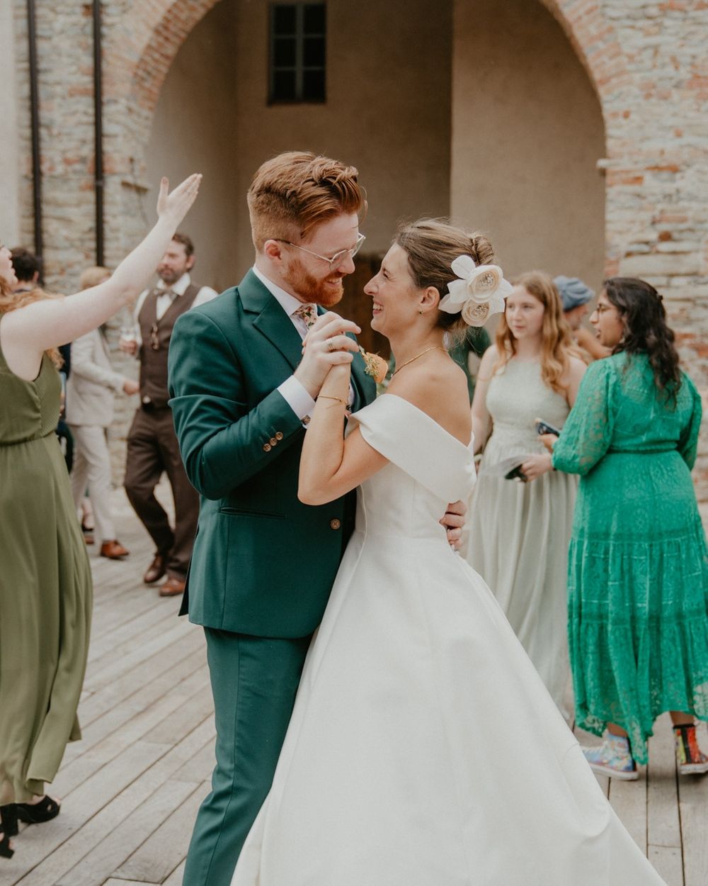 Deep Green Three-Piece Suit with Floral Tie