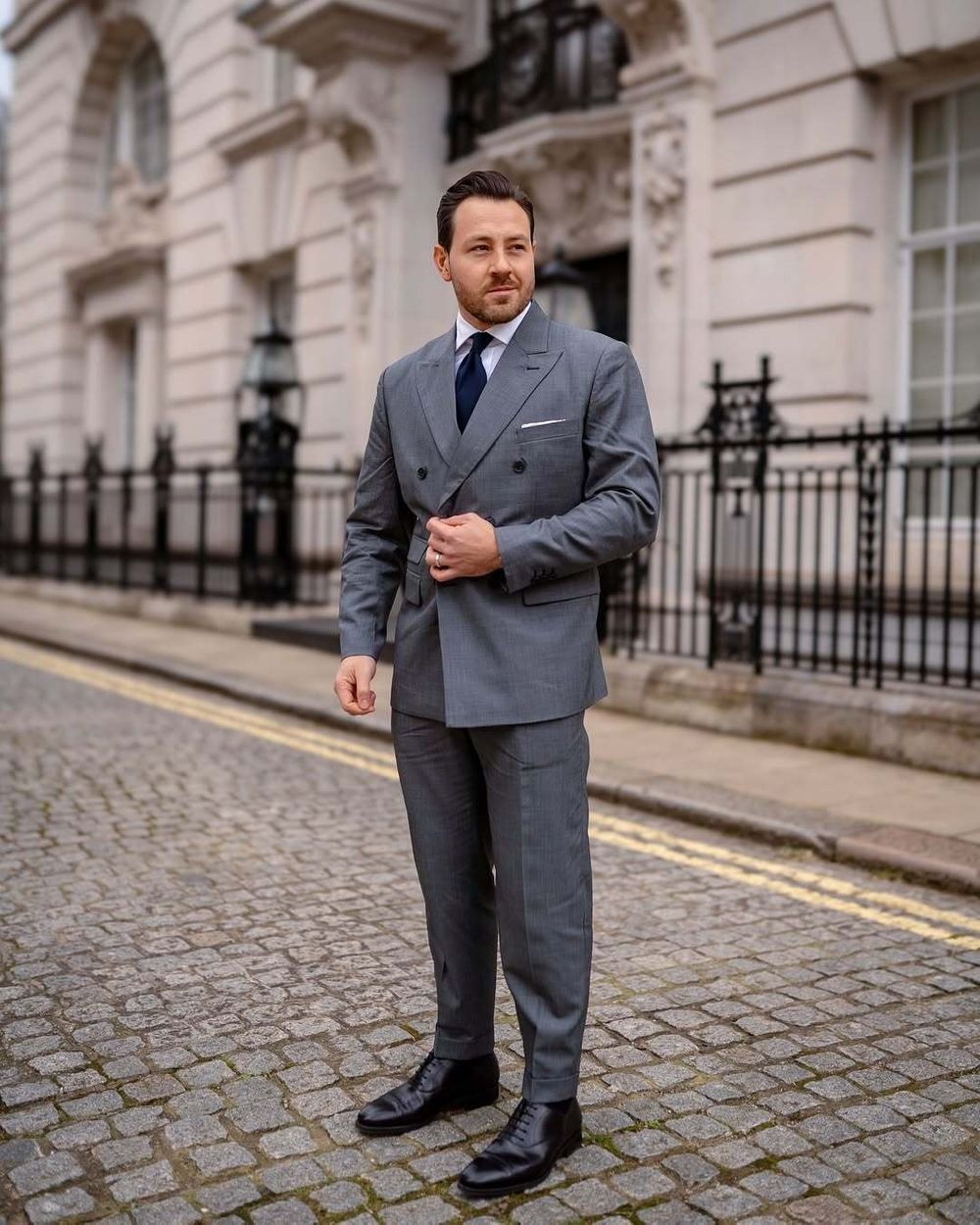 Classic Grey Double-Breasted Suit with Navy Tie