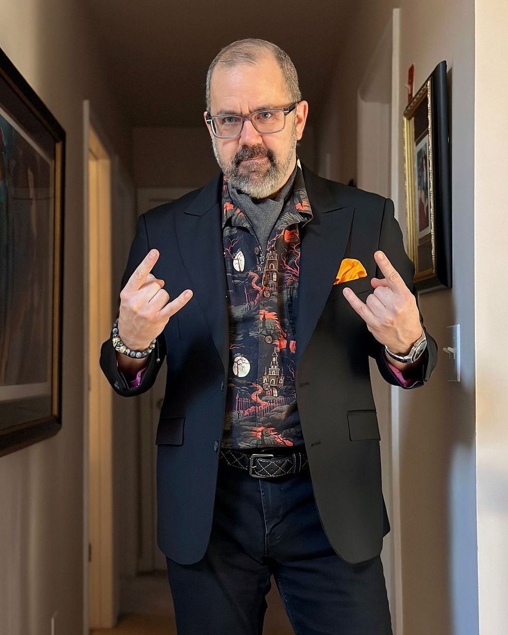 Black Blazer with Graphic Shirt and Orange Pocket Square
