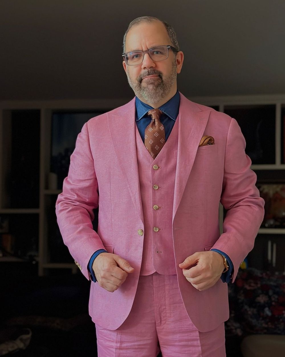 Pink Three-Piece Suit with Navy Shirt and Copper Tie