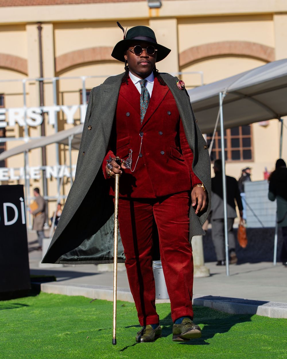 Deep Red Corduroy Suit with Olive Overcoat and Fedora