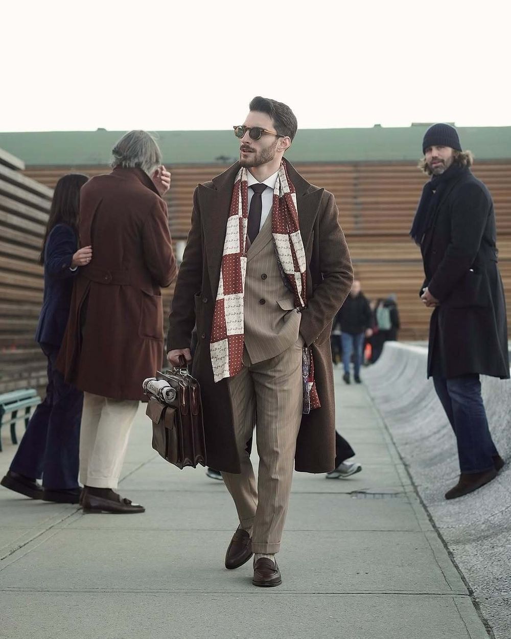 Brown Overcoat with Beige Pinstripe Suit and Patterned Scarf