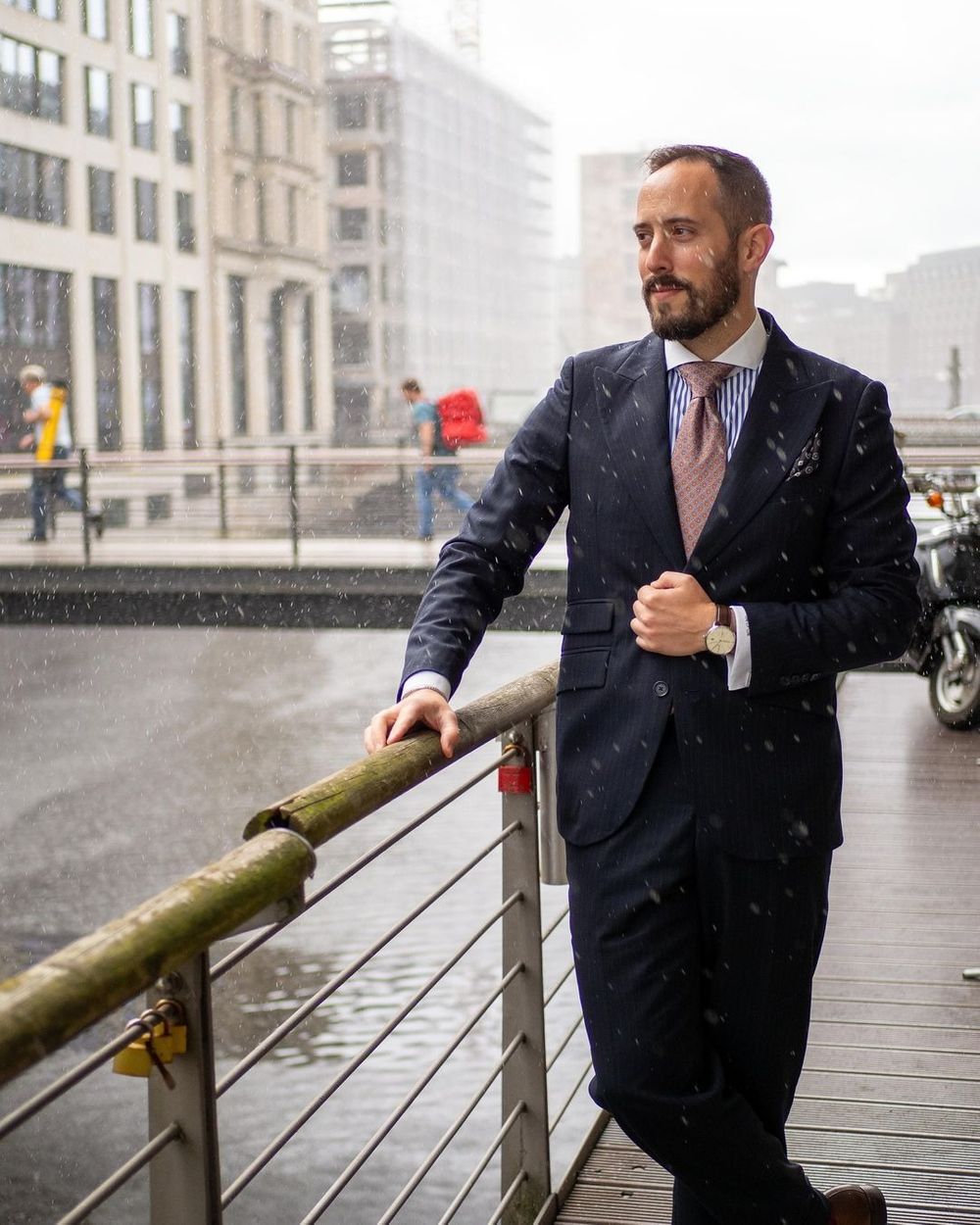 Navy Pinstripe Suit with Striped Shirt and Patterned Tie