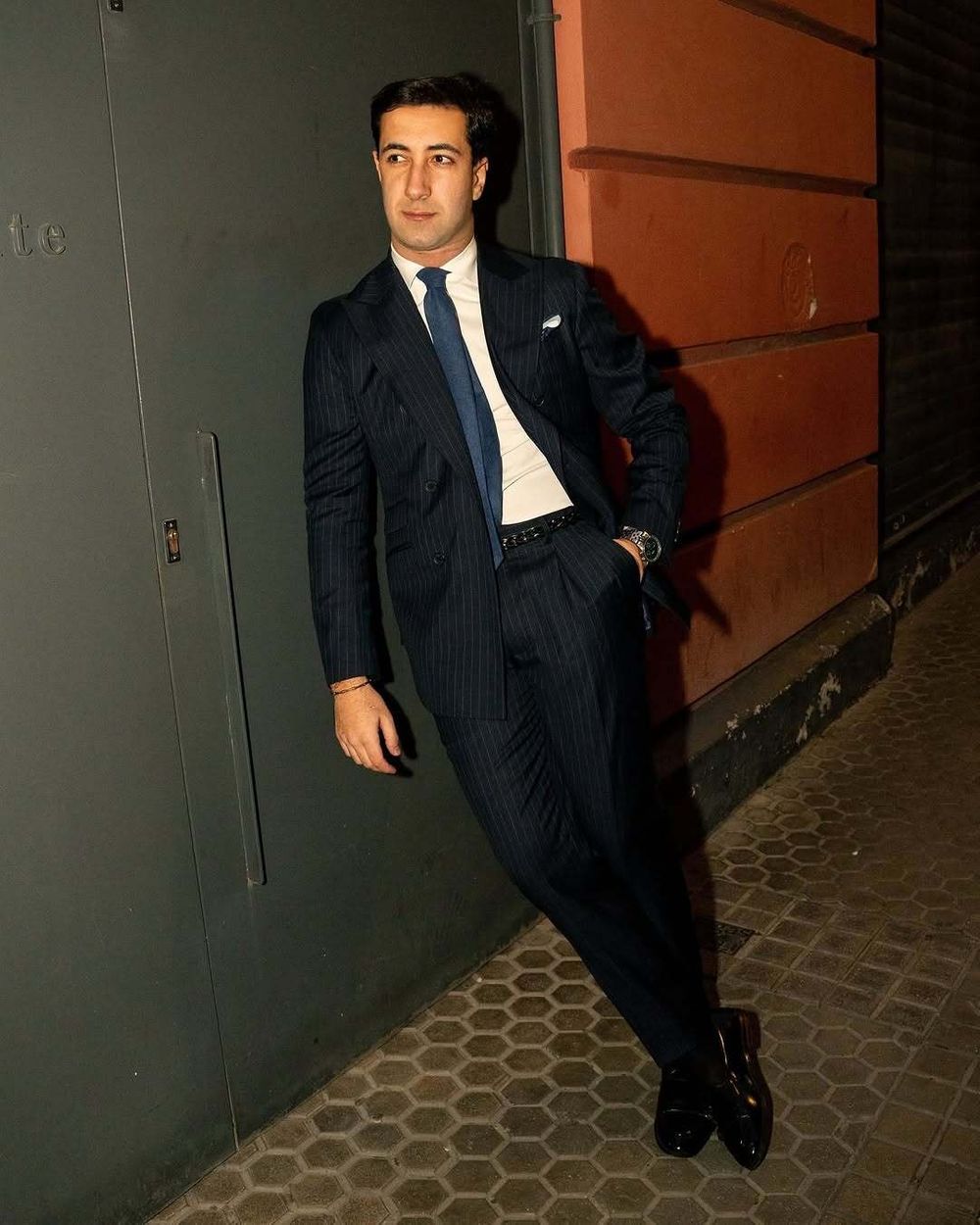 Navy Pinstripe Suit with White Shirt and Blue Tie