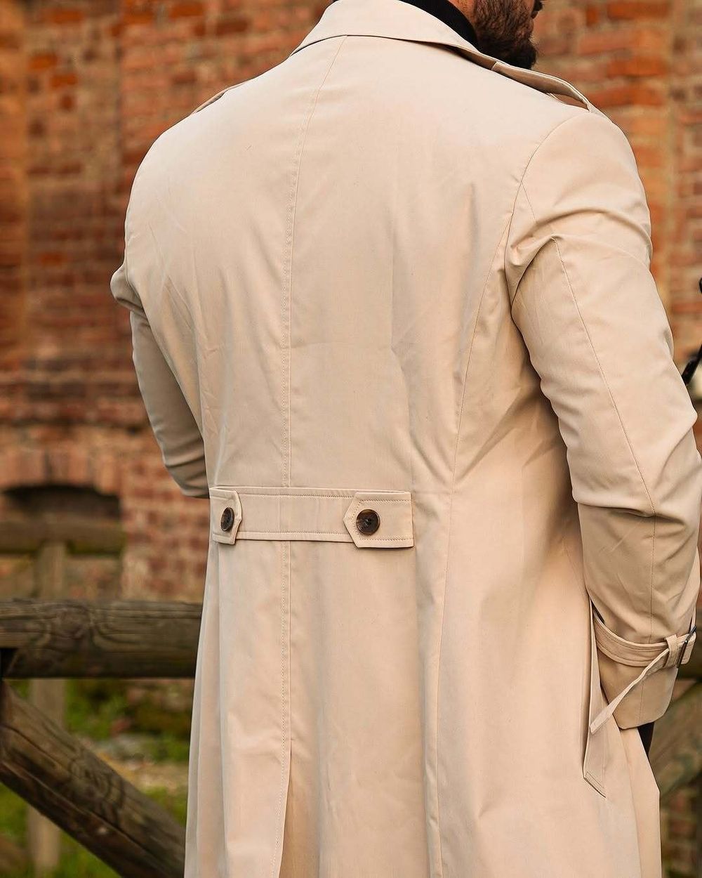 Beige Trench Coat with Black Turtleneck and Brown Trousers