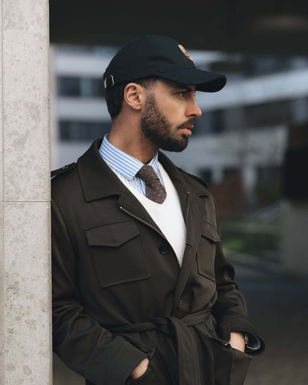 Dark Olive Belted Jacket with Blue Striped Shirt and White Sweater Vest