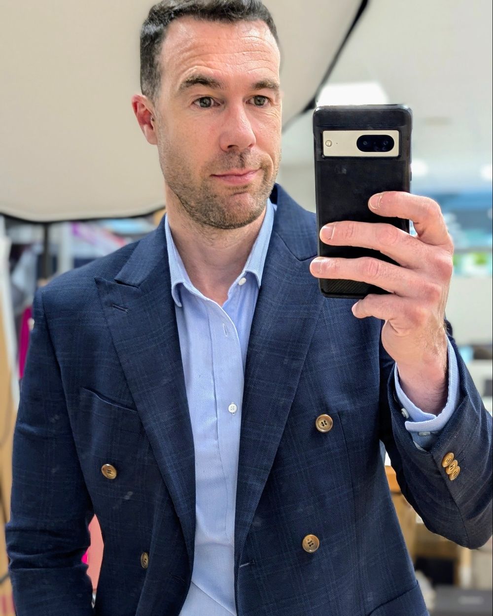 Navy Blazer overcheck with a camel chinos, and sneakers