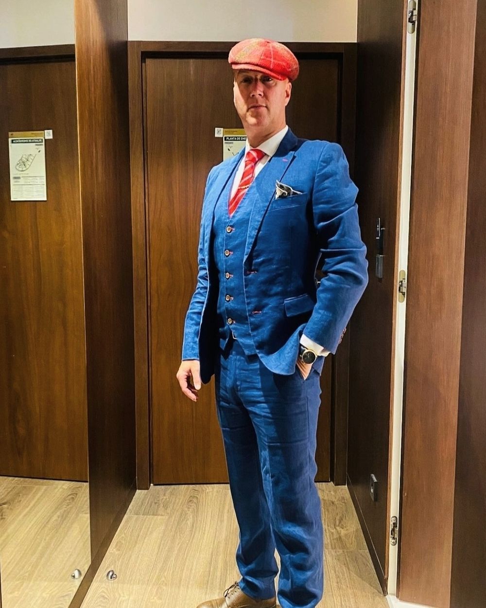 Electric Blue Three-Piece Suit with Red Flat Cap