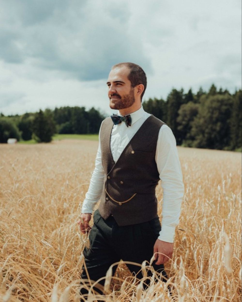 Dark Wool Suit with Blue Tartan Bow Tie
