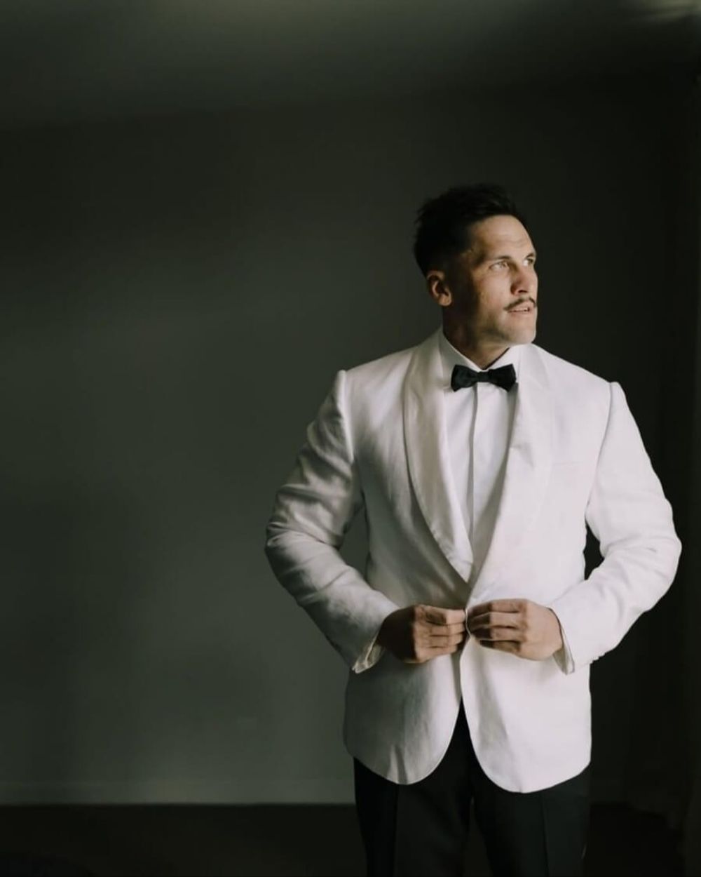 White Dinner Jacket with Classic Black Bow Tie