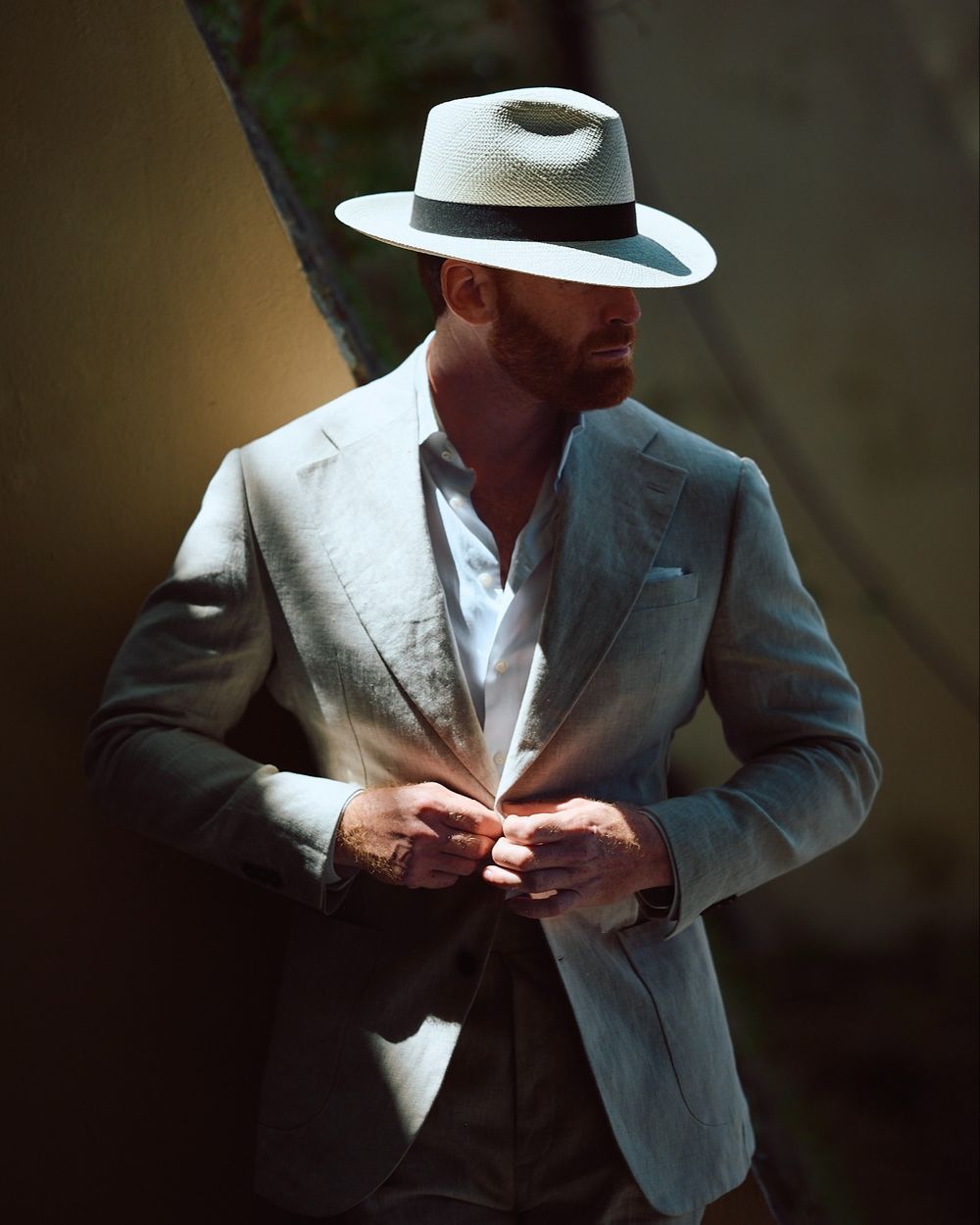 Beige Linen Suit with White Shirt and Panama Hat
