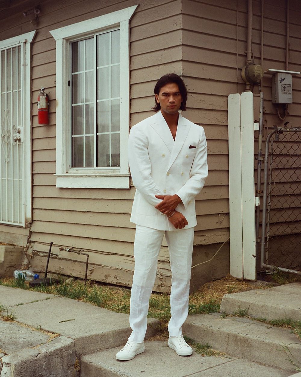 White Double-Breasted Suit with White Trainers