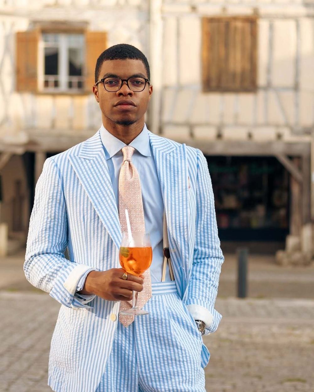 Blue and White Striped Suit with Pale Pink Tie