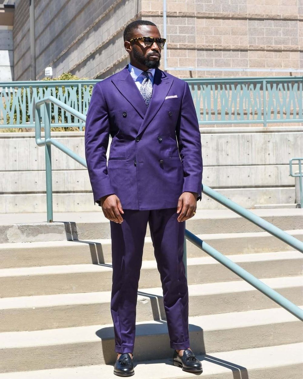 Purple Double-Breasted Suit with Blue Shirt and Patterned Tie