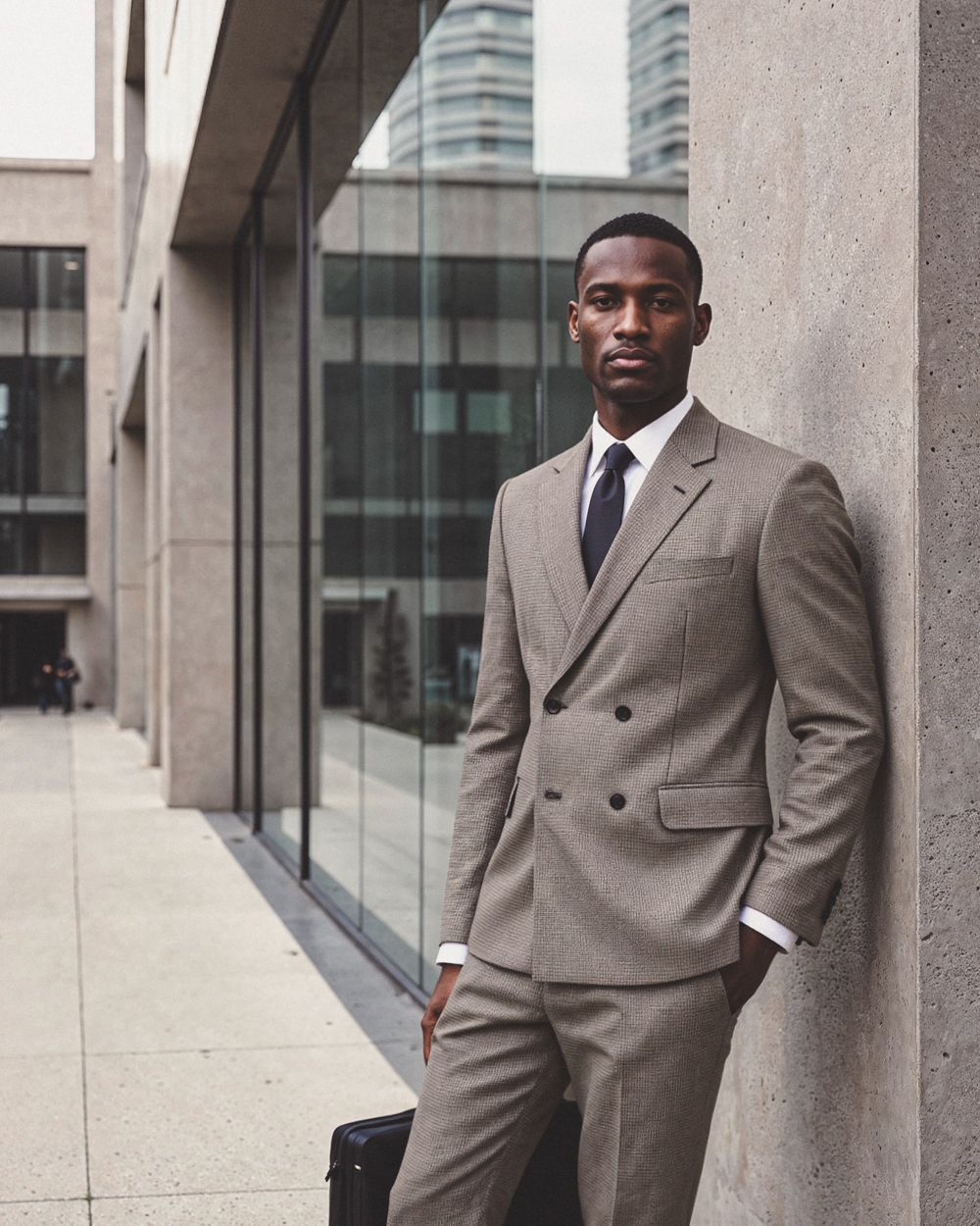 Brown Double-Breasted Suit with White Dress Shirt and Black Tie