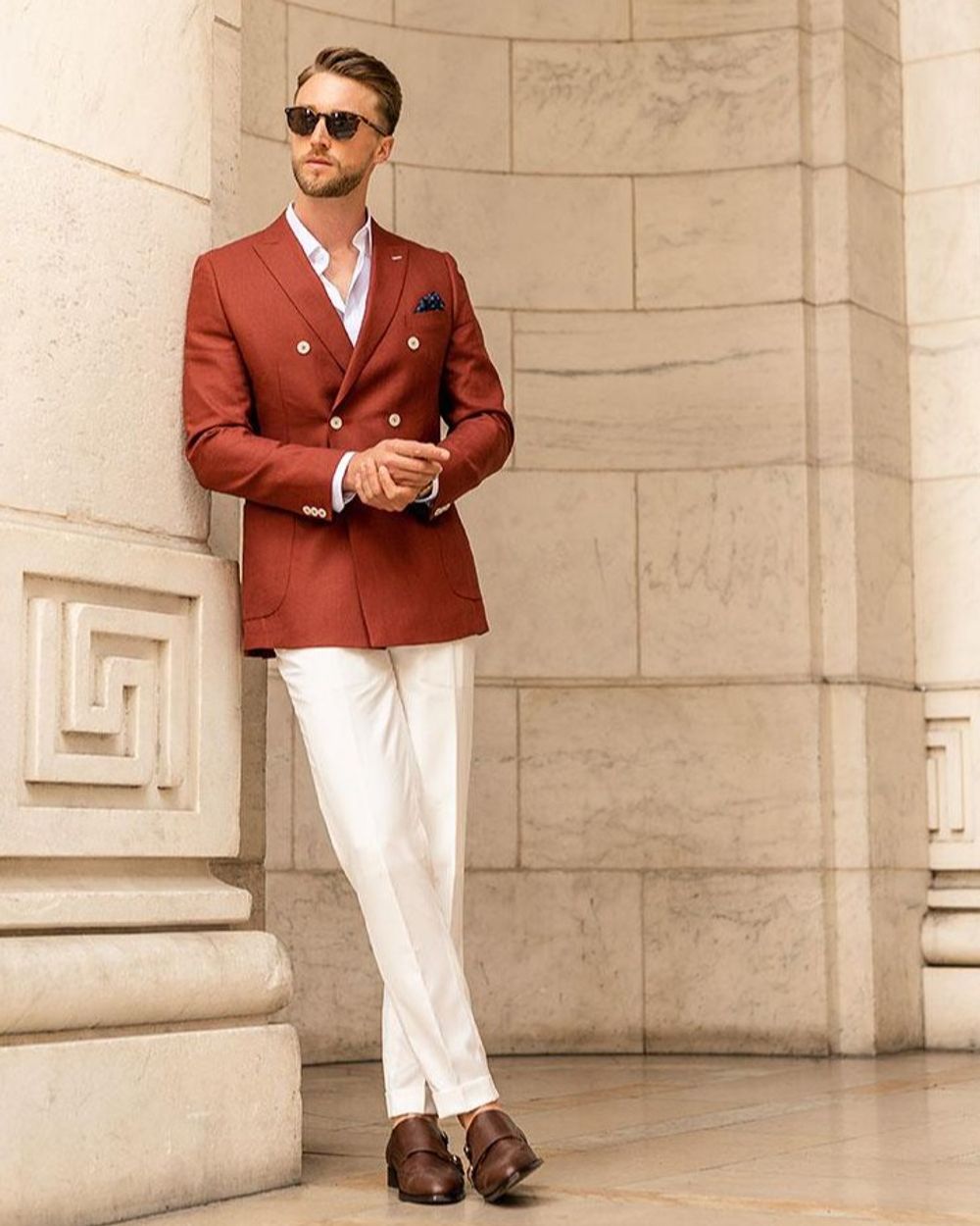 Terracotta linen double breasted blazer with ivory pants and double buckle monk shoes from