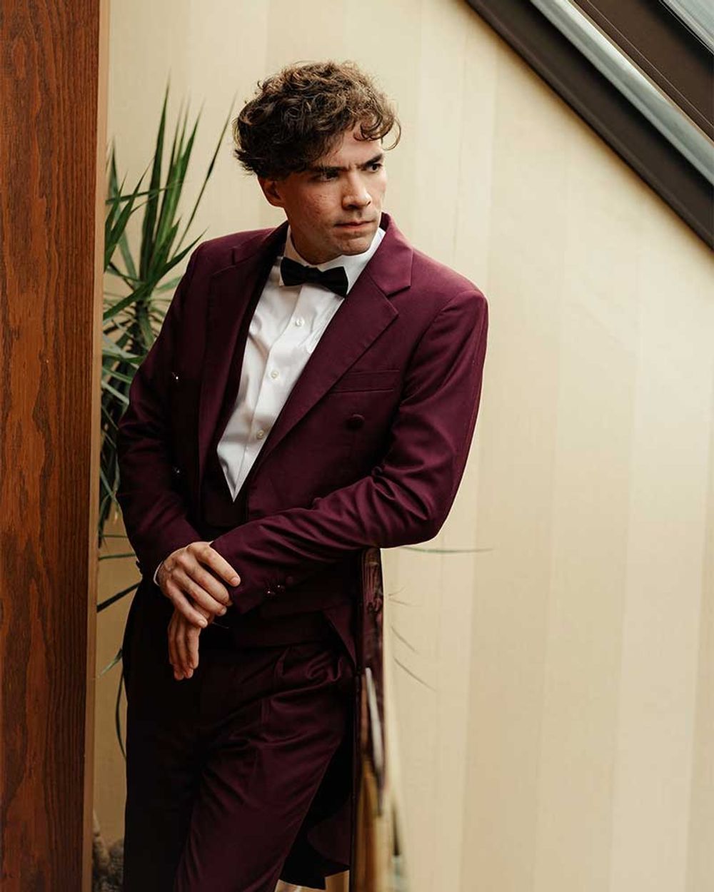 Burgundy Tailcoat Tuxedo with White Dress Shirt and Black Bow Tie