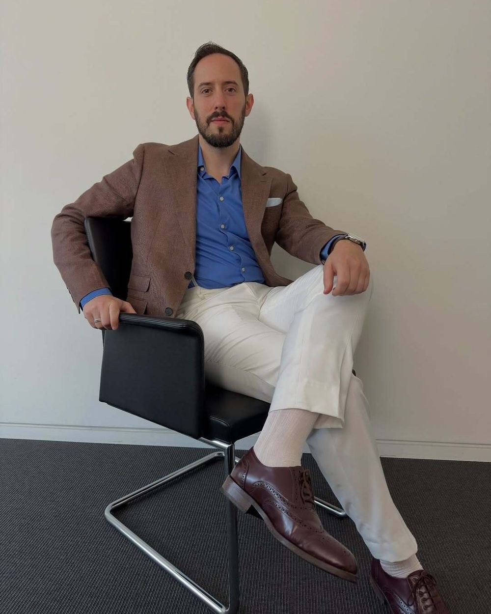 Brown Jacket with Blue Shirt and Ivory Trousers
