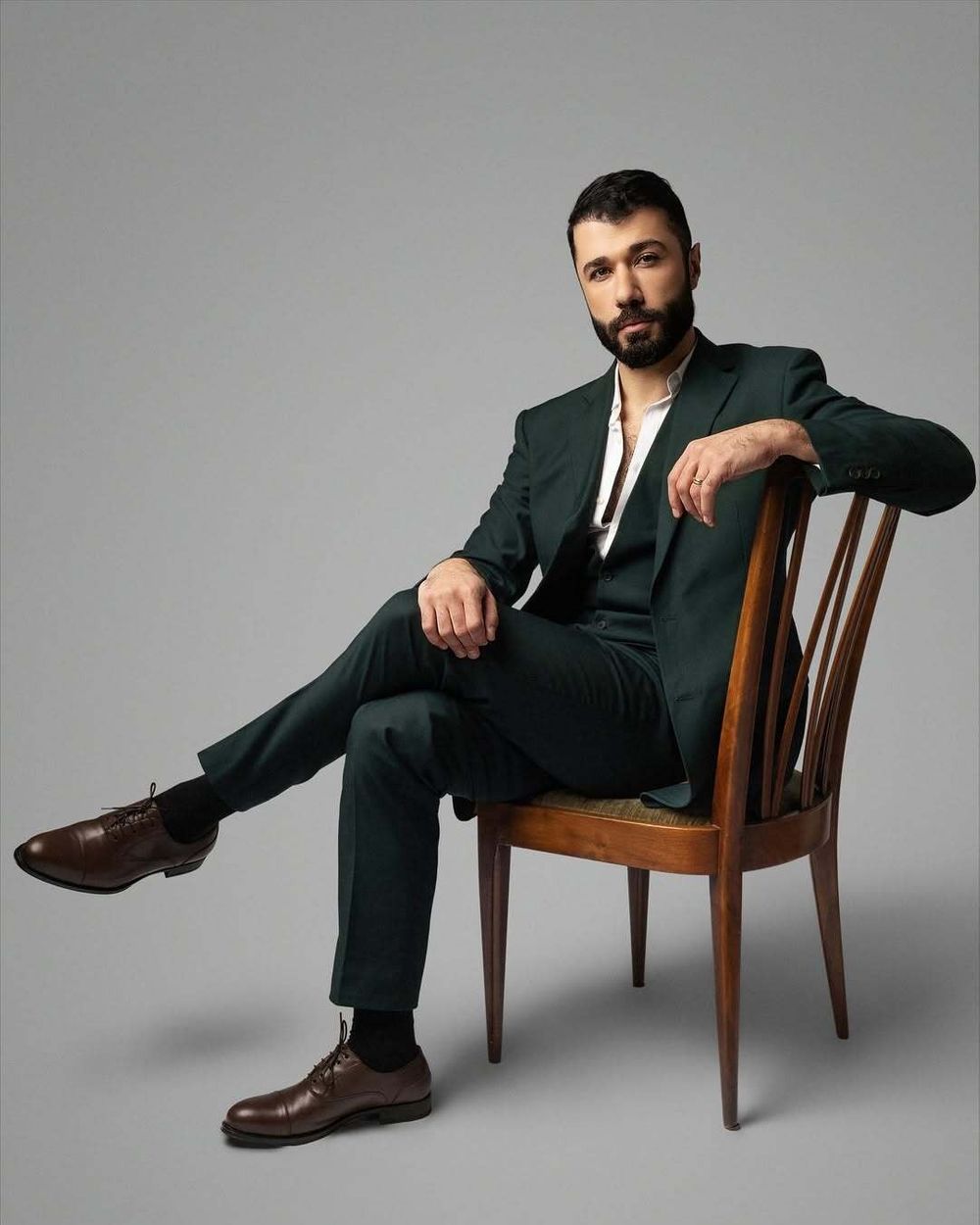 Dark Green Three-Piece Suit with White Shirt