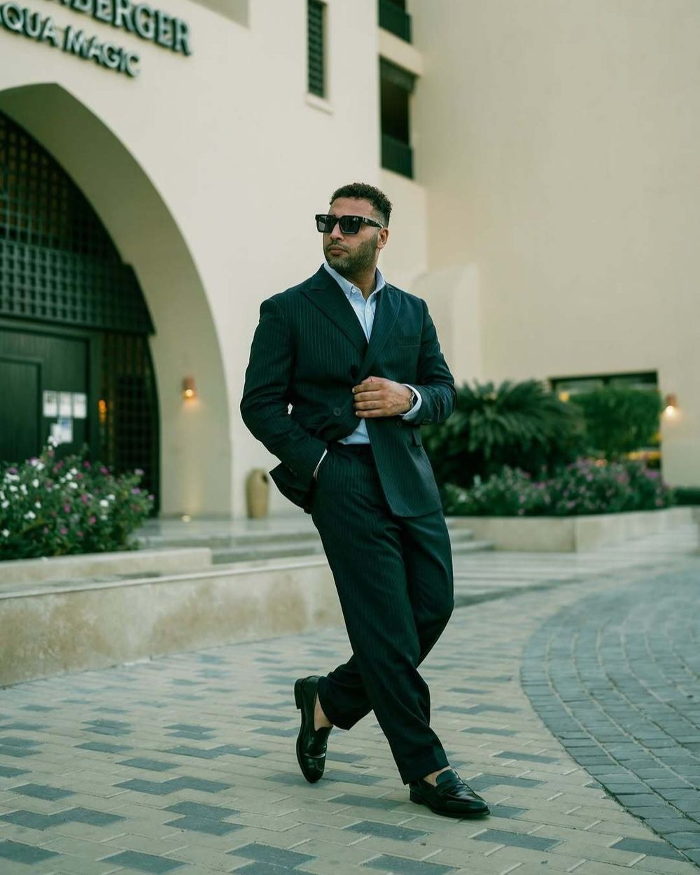 Pinstripe Double-Breasted Suit with Light Blue Shirt