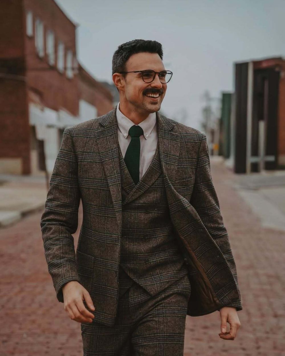 Brown Check Three-Piece Suit with White Shirt and Green Tie