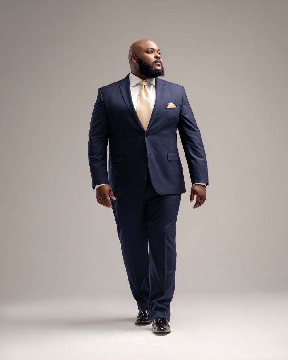 Blue Suit with White Shirt and Champagne Tie