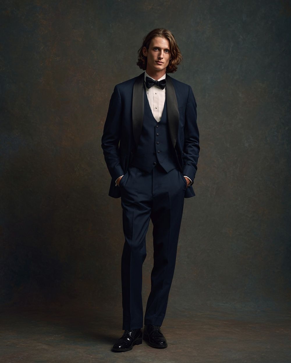 Navy Three-Piece Tuxedo with Satin Lapels and Bow Tie