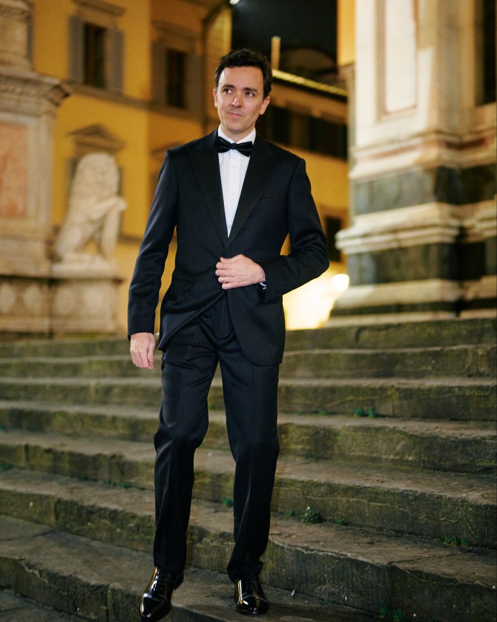 Black Tuxedo Suit with White Dress Shirt and Black Bow Tie