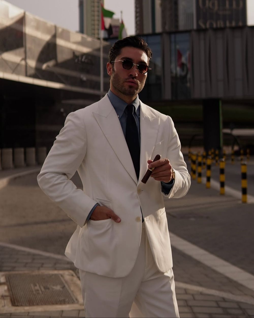 White Suit with Blue Shirt and Black Tie