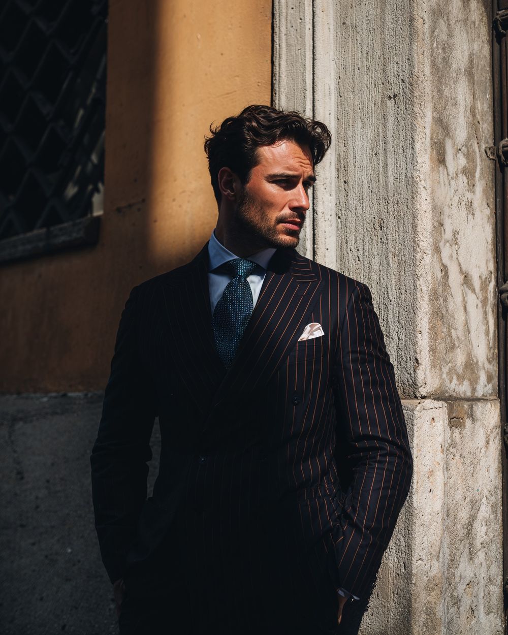 Pinstripe Double-Breasted Suit with Blue Shirt