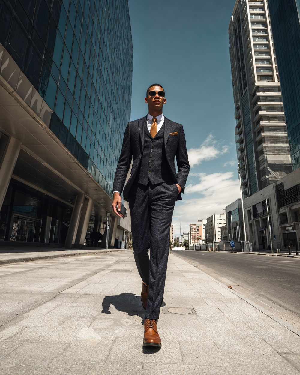 Charcoal Three-Piece Suit with Gold Tie