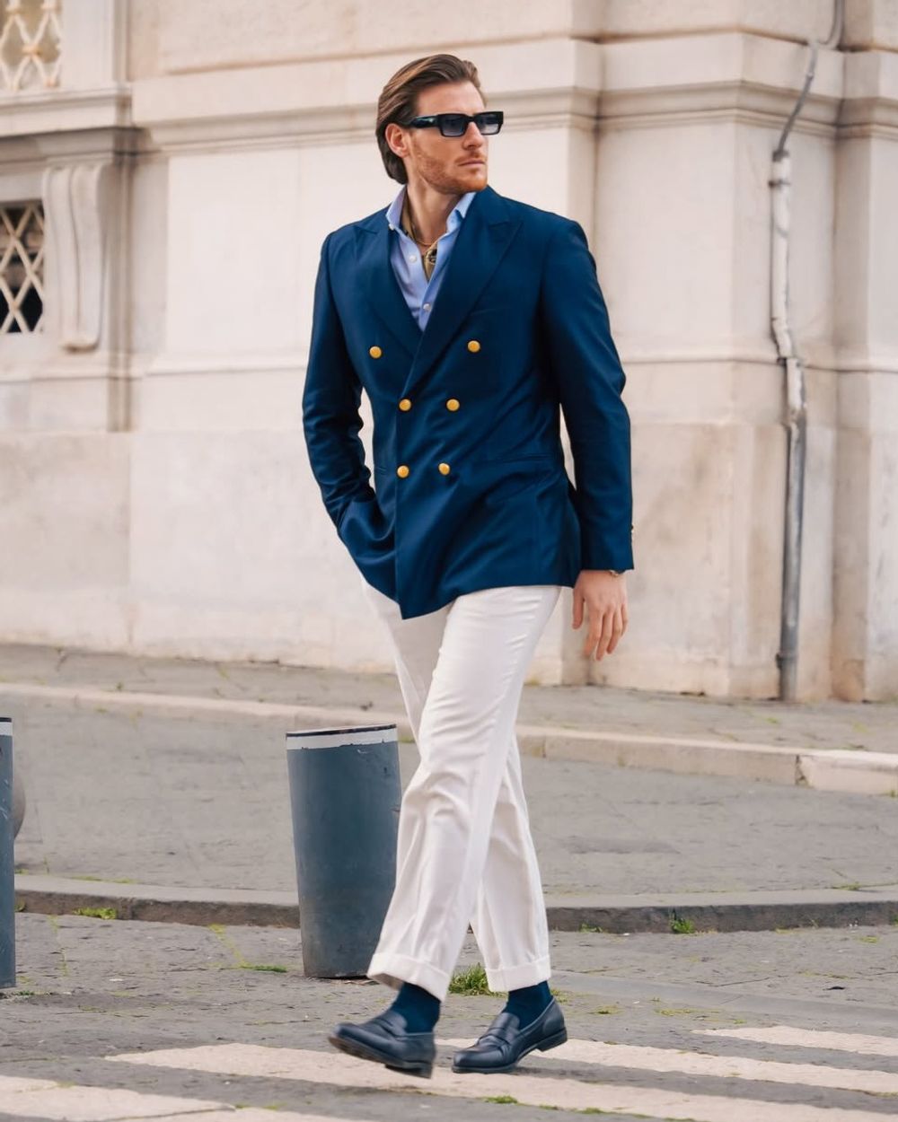 Navy blue double-breasted suit with white pants and gold buttons Navy blue double-breasted suit with white pants and gold buttons