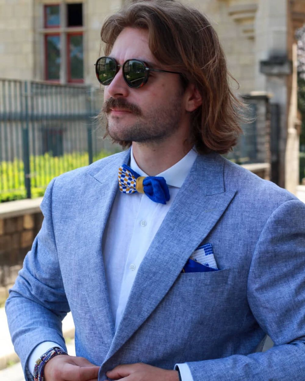 burgundy suit grey tie
