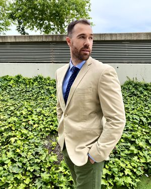 Cotton blazer and green chino pants
