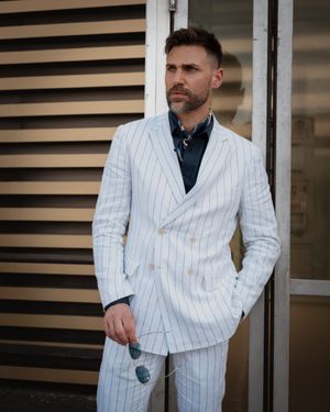 White Pinstripe Suit with Navy Shirt