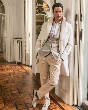 Cream Coat with Beige Pants and Suede Shoes