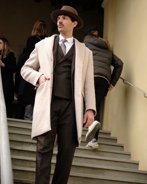 Brown Wool Suit with Beige Overcoat and Fedora