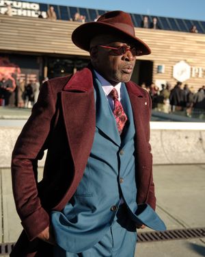 teal-suit-burgundy-overcoat-fedora