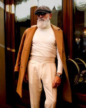 Camel Overcoat with Ivory Turtleneck and High-Waisted Trousers