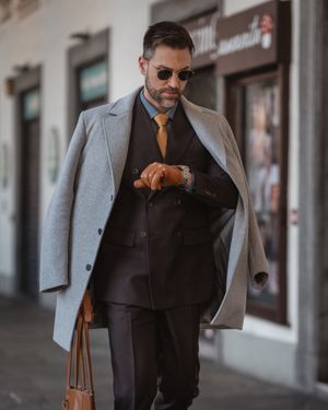 Dark Brown Suit with Gray Wool Overcoat and Gold Tie
