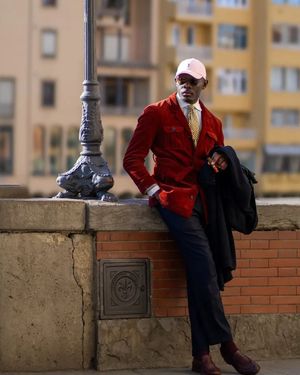 Red Velvet Jacket with Navy Trousers
