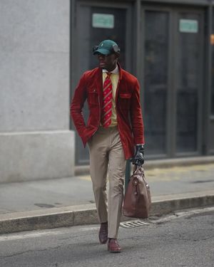 Red Velvet Jacket with Beige Trousers
