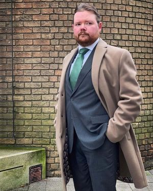 Pinstripe Suit with Camel Overcoat	