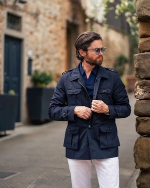 navy-utility-jacket-navy-shirt-white-trousers